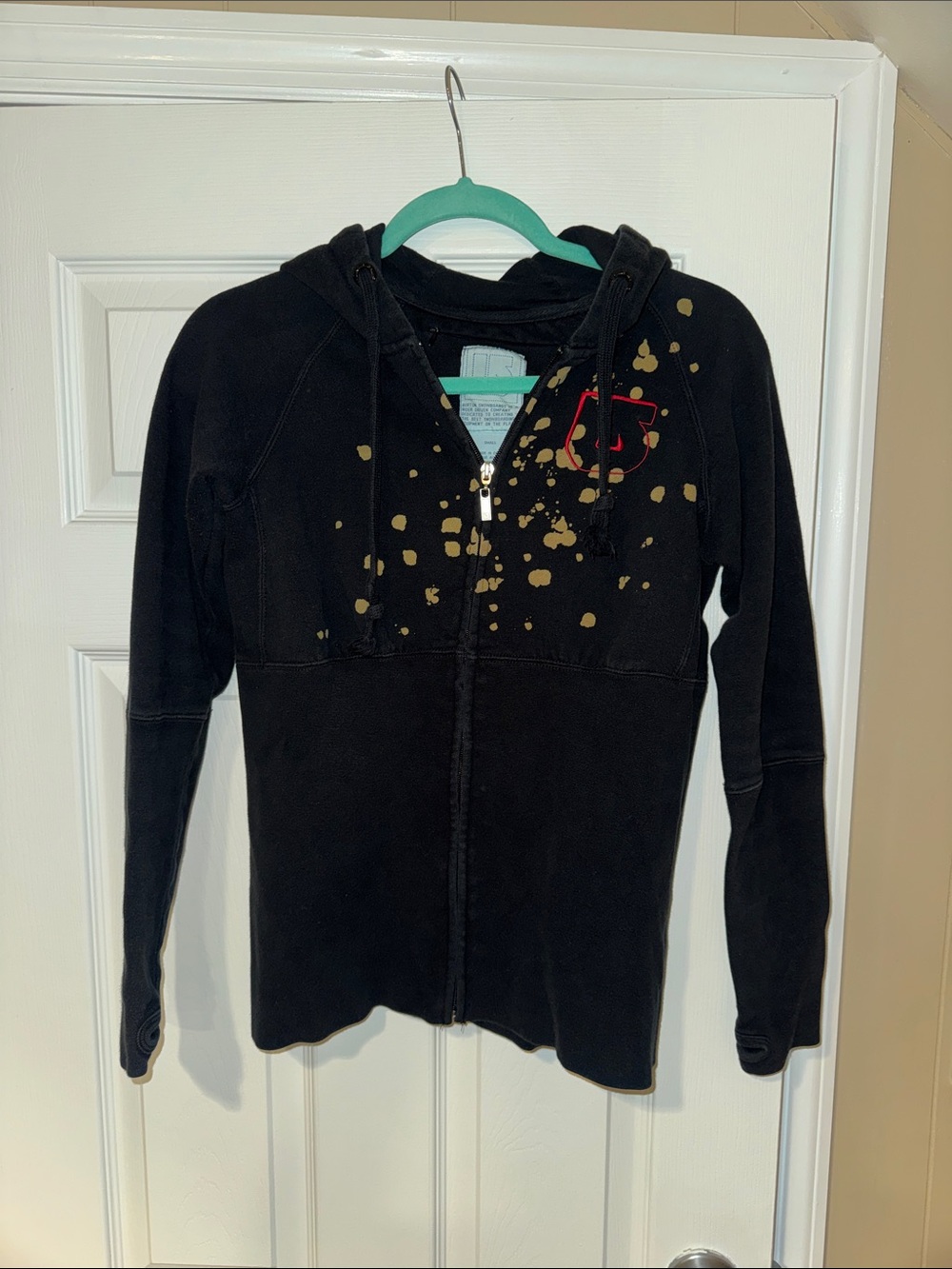 Burton black hoodie with splatter and skull design